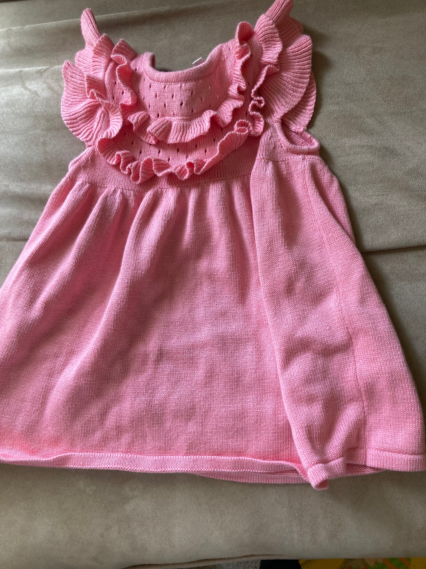 Pink sleeveless ruffle sweater dress